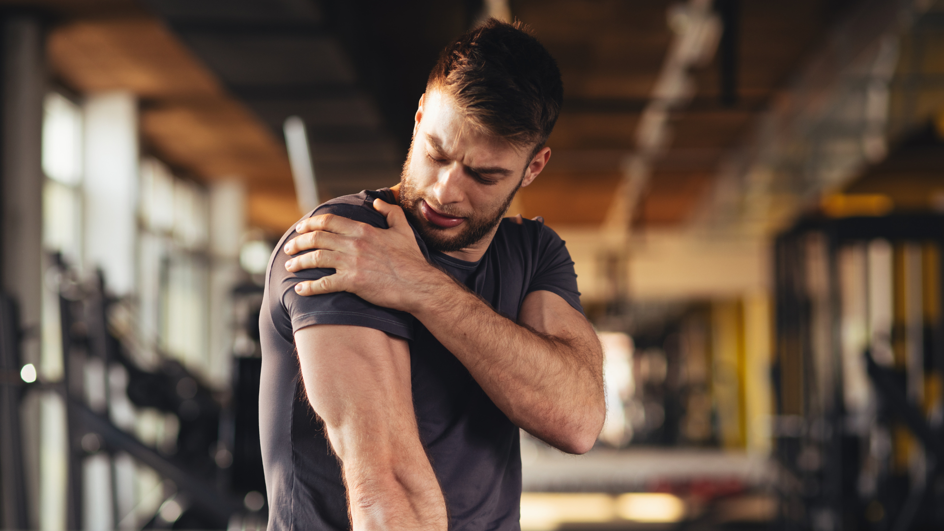 A person having shoulder pain in his right hand