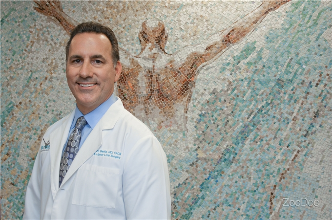 dr. badia in front of mosaic