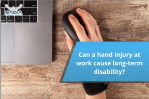 Can a hand injury at work cause long-term disability?