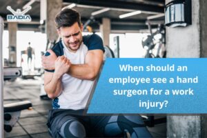 When should an employee see a hand surgeon for a work injury?