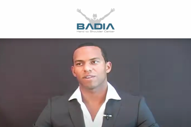 Shaune Fraser Cayman Islands Olympic Swimmer Visits Dr. Badia for Hand Problem