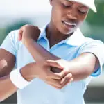 Woman Holding Elbow Bahamas